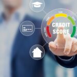 Picture of "credit score" written in a circle and a man pushing the circle